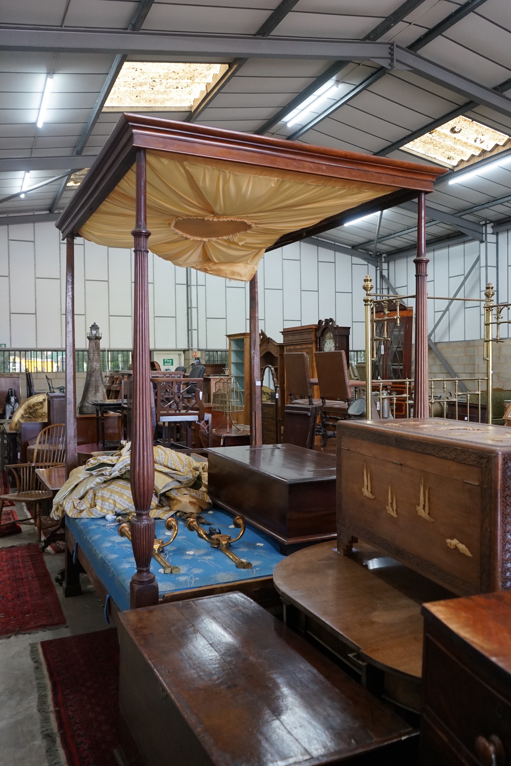 A George III mahogany four poster bed, length 204cm, depth 156cm, height 250cm